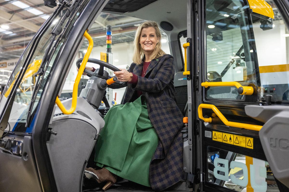 Sophie opens new &pound;100m JCB plant and receives charity cheque for NSPCC