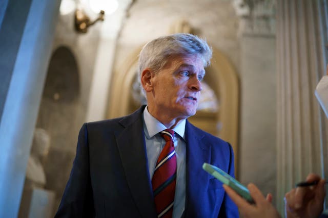 <p>Sen. Bill Cassidy, R-La., pauses outside the chamber during a confirmation vote, at the Capitol in Washington, Oct. 5, 2021.</p>