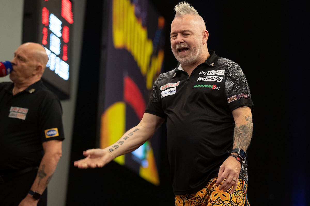 Peter Wright crashed out of the Grand Slam of Darts at the group stage (Taylor Lanning/PDC)