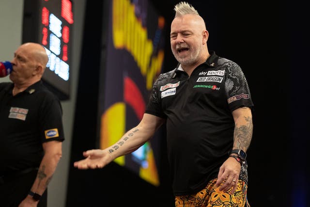 Peter Wright crashed out of the Grand Slam of Darts at the group stage (Taylor Lanning/PDC)