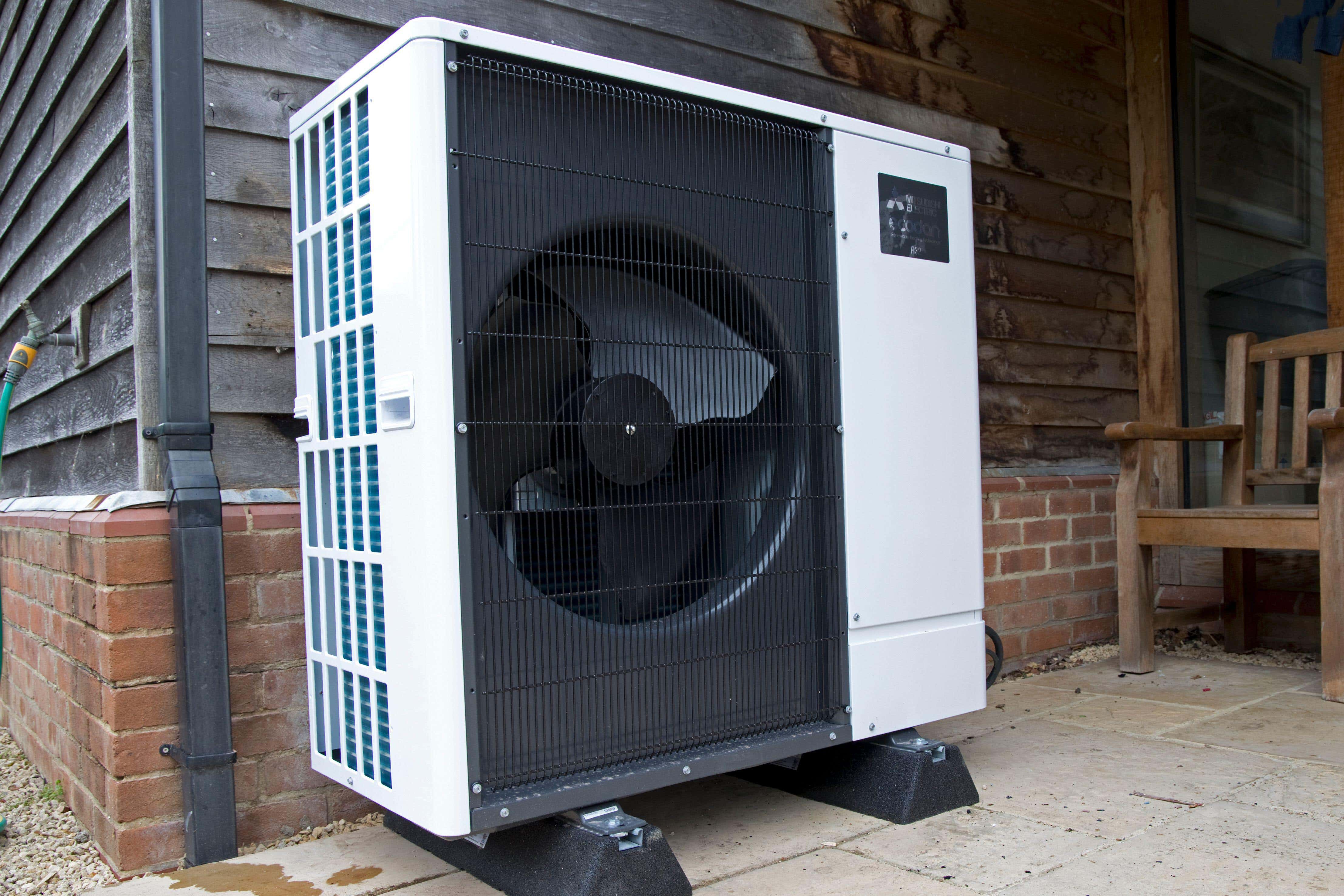 An air source heat pump installed at an ecohouse in the Cotswolds (Alamy/PA)