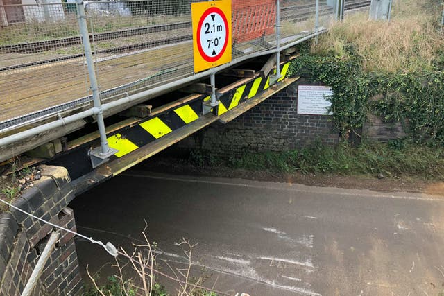The railway bridge at Stonea Road in Cambridgeshire is number one in Britain’s 10 most-bashed railway bridges (Network Rail/PA)