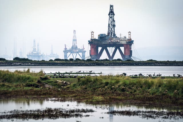 Oil and gas companies have benefitted from a massive spike in global energy prices (Jane Barlow/PA)