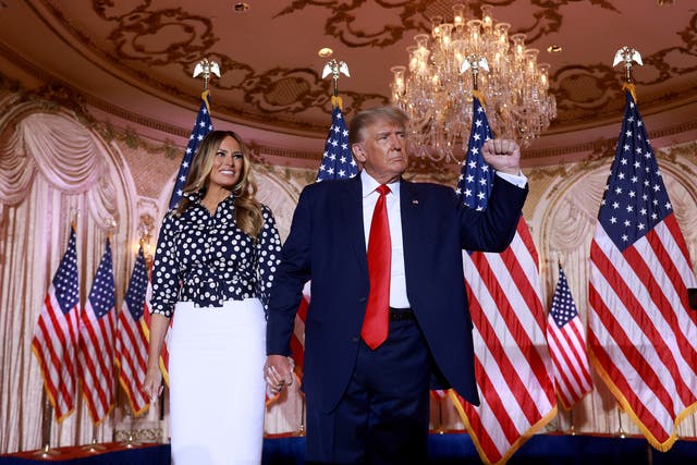 <p>Former US president Donald Trump and former first lady Melania Trump stand together during an event at his Mar-a-Lago home</p>
