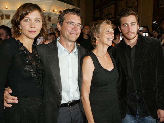 <p>Maggie Gyllenhaal and Jake Gyllenhaal pose with their parents on the red carpet for the Toronto International Film Festival (TIFF) gala screening of the film “Bee Season” on September 11, 2005</p>