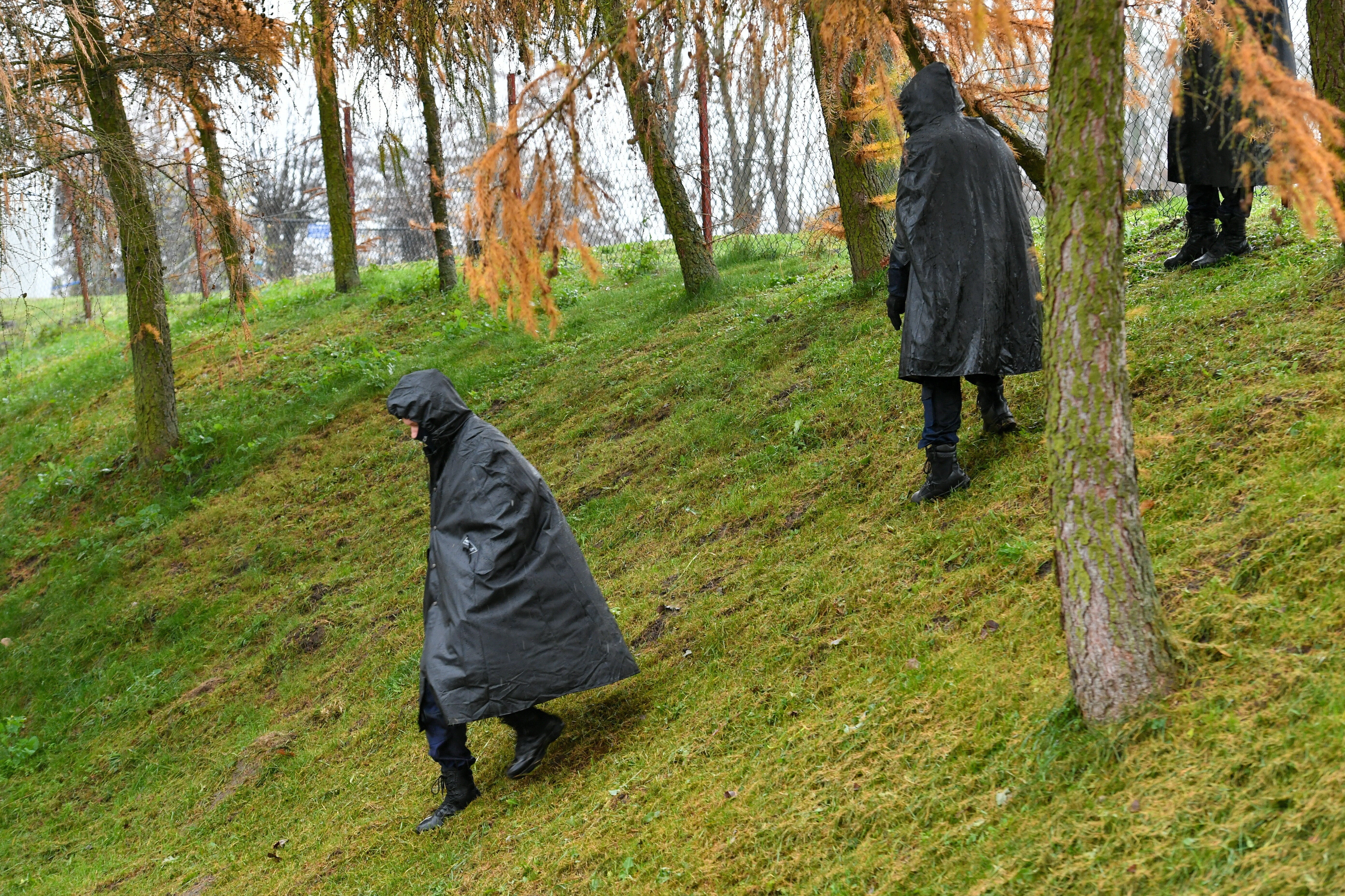 Police and secret services near the site of the missile strike in Poland