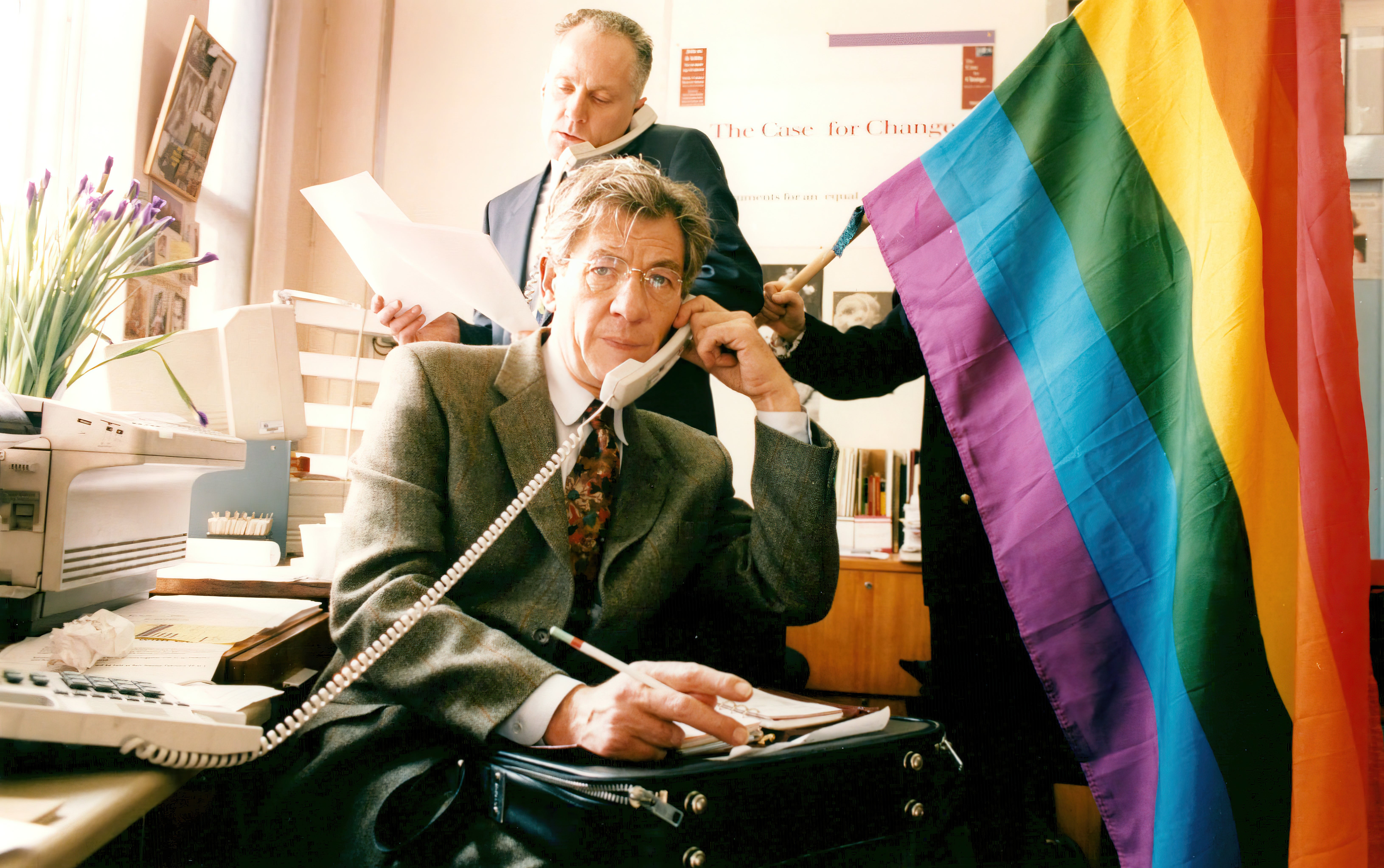 Sir Ian McKellen on the phone at Stonewall offices before the government’s age of consent reform in 1994.