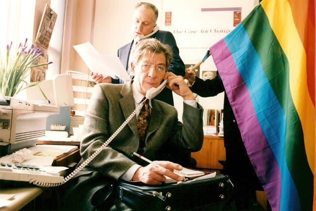 <p>Sir Ian McKellen on the phone at Stonewall offices before the government’s age of consent reform in 1994.</p>