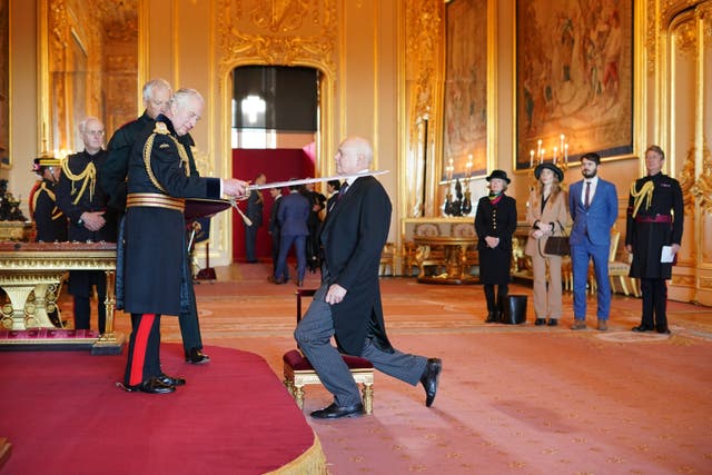 Iain Duncan Smith receives his knighthood (Jonathan Brady/PA)