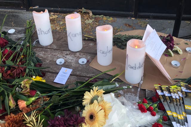 <p>A makeshift memorial left for the victims of Sunday’s violent attack </p>