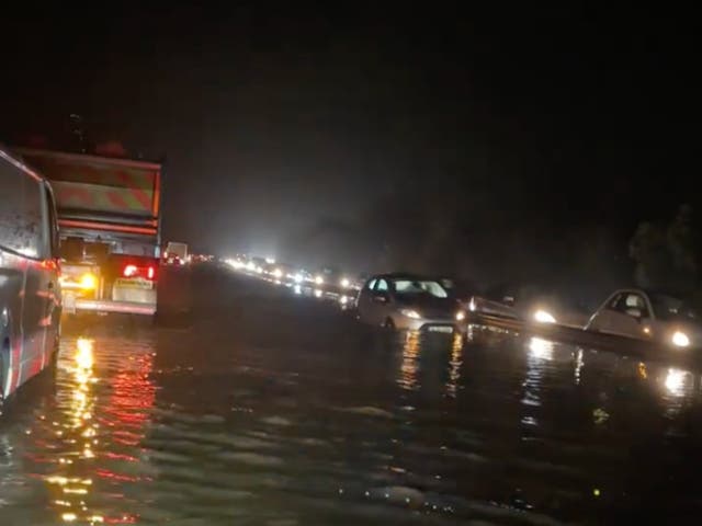 <p>Cars stuck in flood waters on A27  in West Sussex</p>