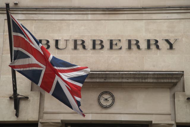 Luxury fashion retailer Burberry has seen its revenues jump (Yui Mok/ PA)