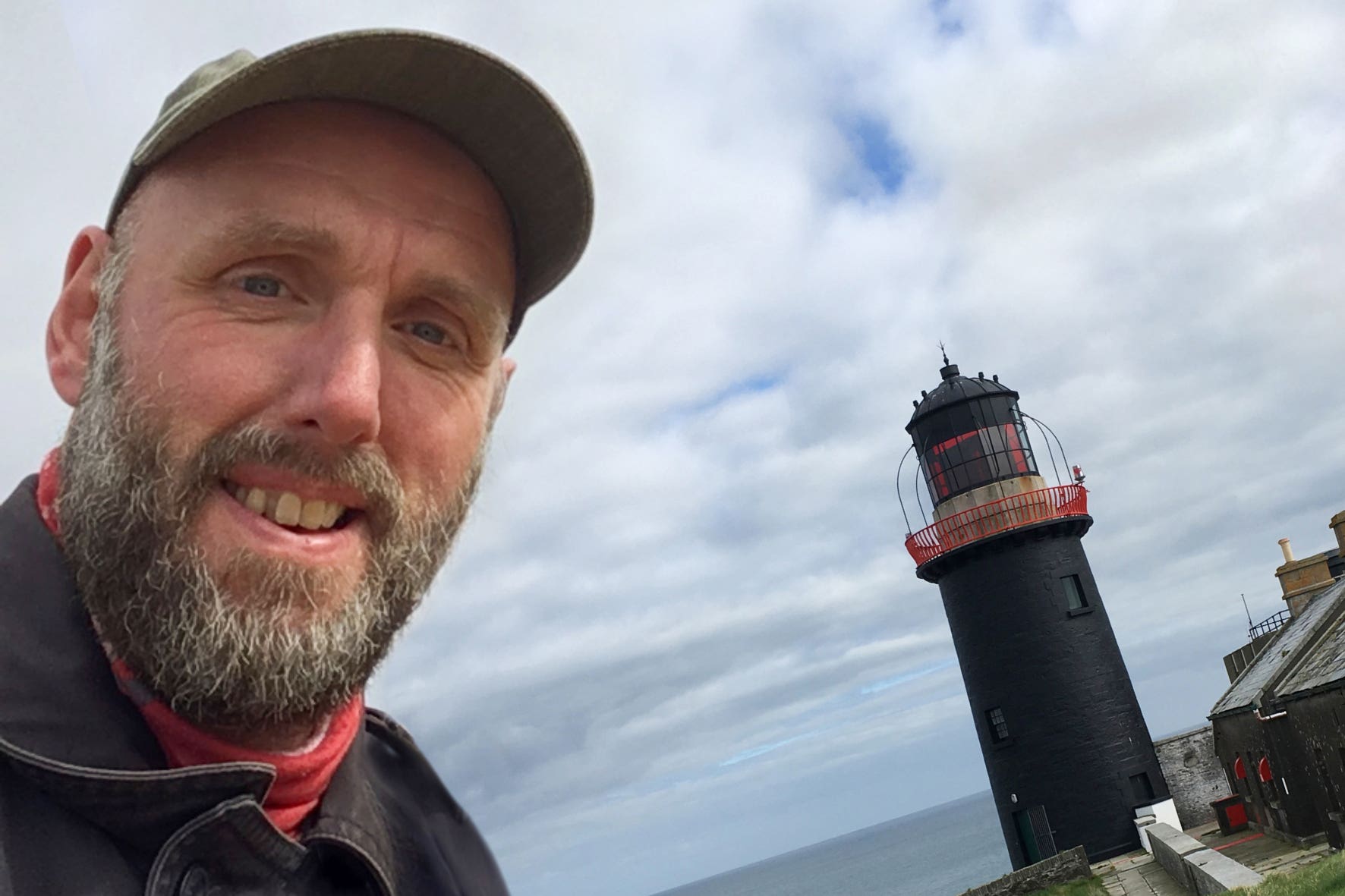 Belgian designer Bert Dufour, pictured at Ballycotton Lighthouse, Co Cork, is on course to create colourful prints of every one of the 80 lighthouses guarding Ireland’s coastline (Bert Dufour/PA)