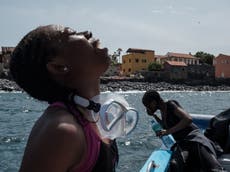 The African scuba divers rewriting the slave trade narrative