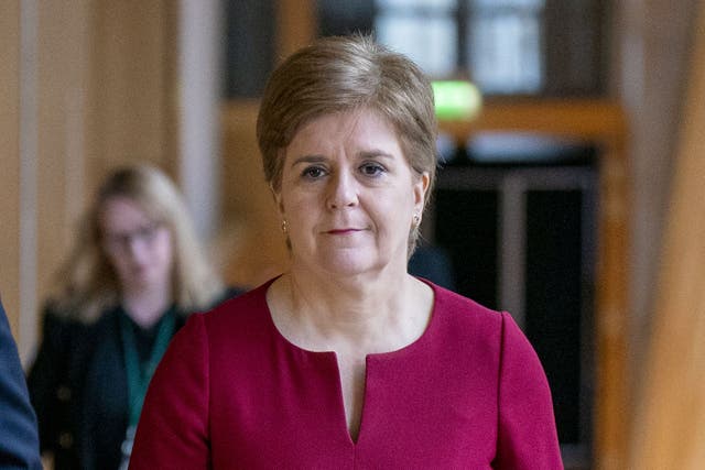 Nicola Sturgeon accused the Tories of ‘repeating the mistakes of the past’ as the Chancellor outlined his autumn statement (Jane Barlow/PA)