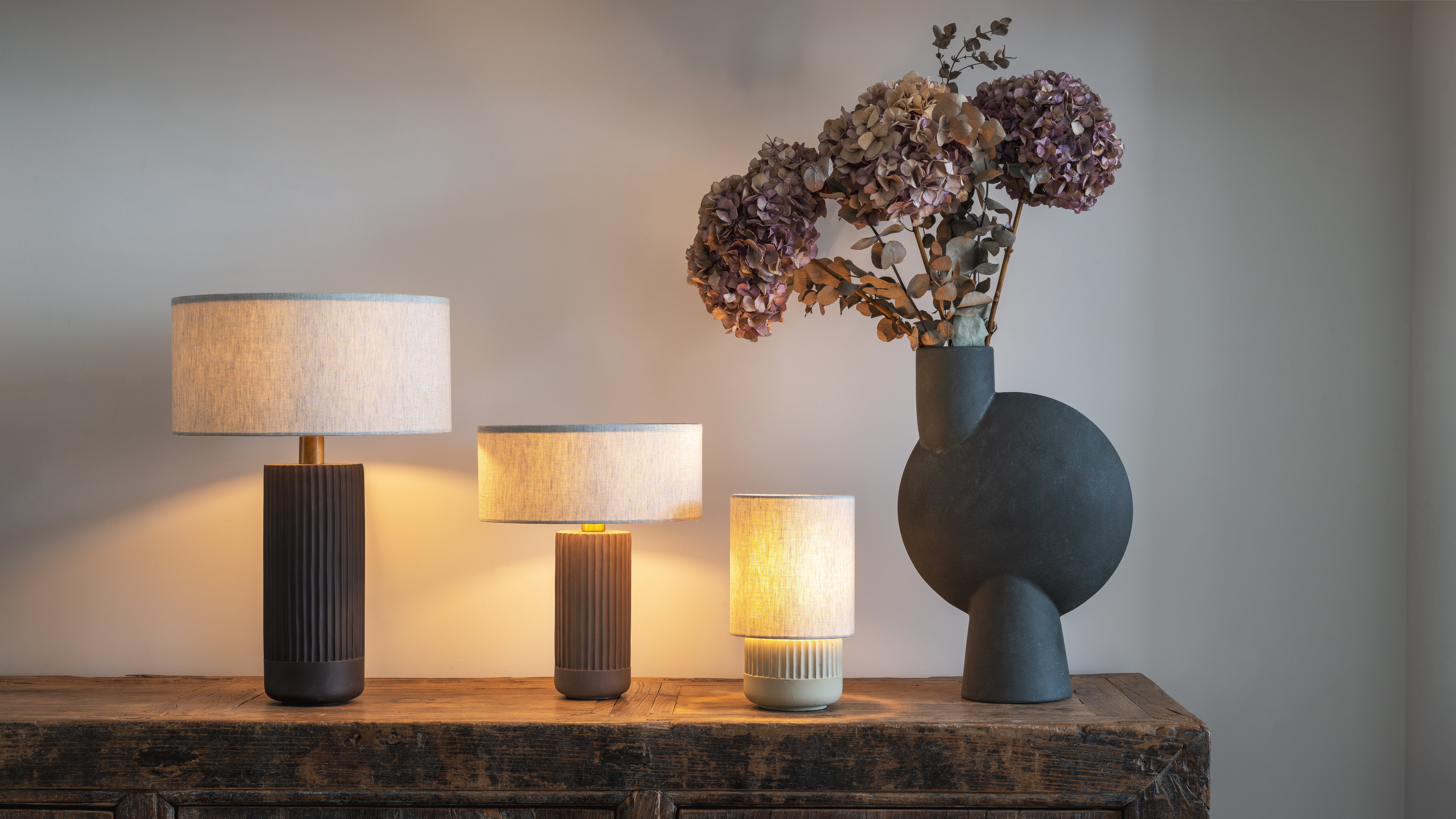 The Nitara Lamp, £119, Avero Lamp, £99, and Enza Lamp, £79, generate a tranquil glow