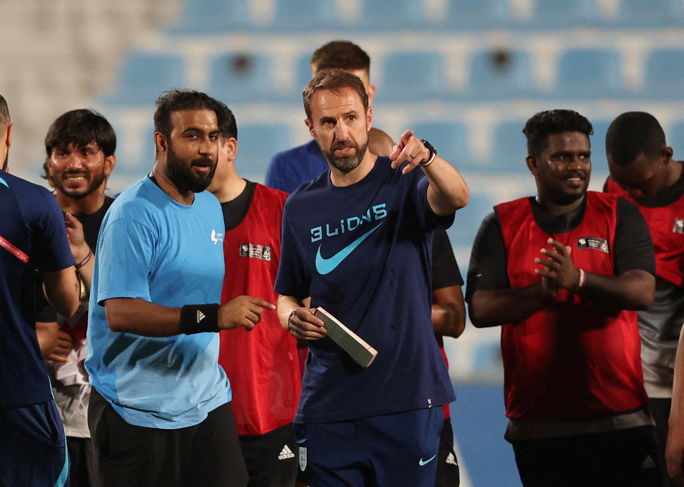 Gareth Southgate and his side met a group of migrant workers