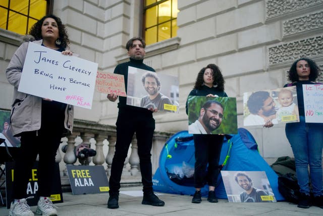 Mona Seif (left), the sister of Alaa Abd el-Fattah, a British-Egyptian activist imprisoned in Egypt, held a protest outside the Foreign Office (PA)