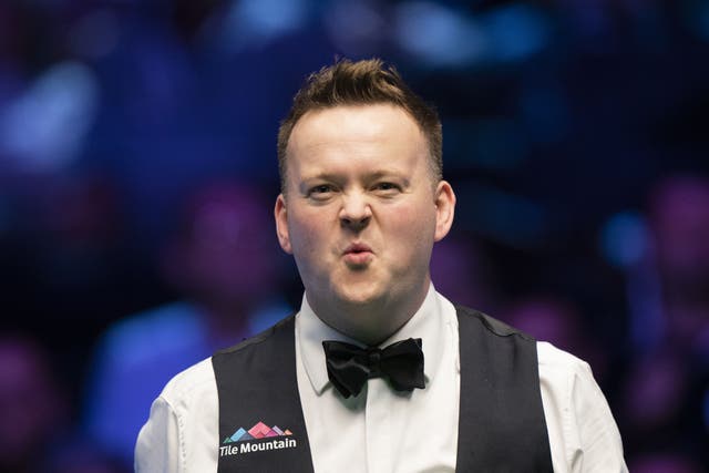 Shaun Murphy defied the “agony” of a neck injury to beat Judd Trump in York (Tim Goode/PA)