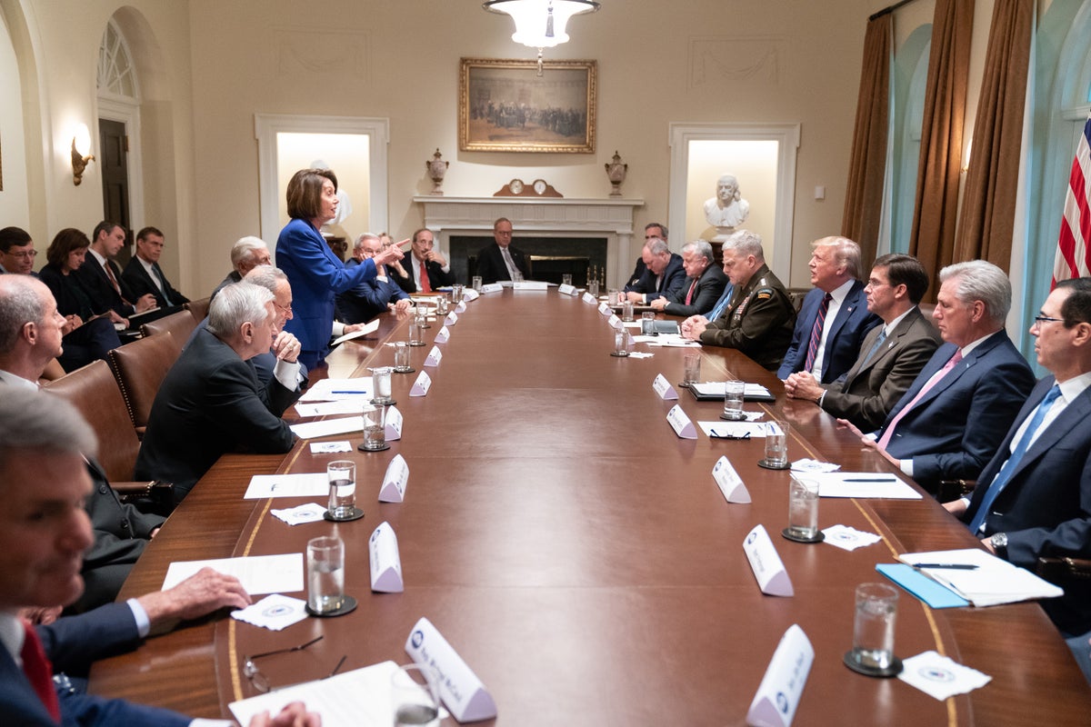 ‘In a room of men’: Inspiring photo of Pelosi goes viral as she calls for more women in power after departure