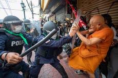 Police fire rubber bullets at protesters, cars overturned on sidelines of APEC summit in Bangkok
