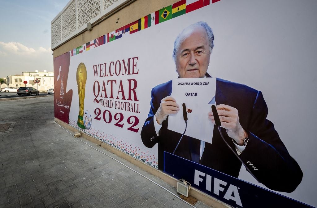 A picture of former Fifa president Joseph Blatter opening the envelope to reveal that Qatar would host the 2022 World Cup