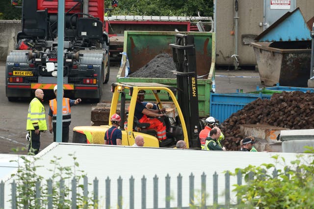 The scene at Hawkeswood Metal Recycling in the Nechells area of Birmingham where five men died after a wall collapsed (PA)