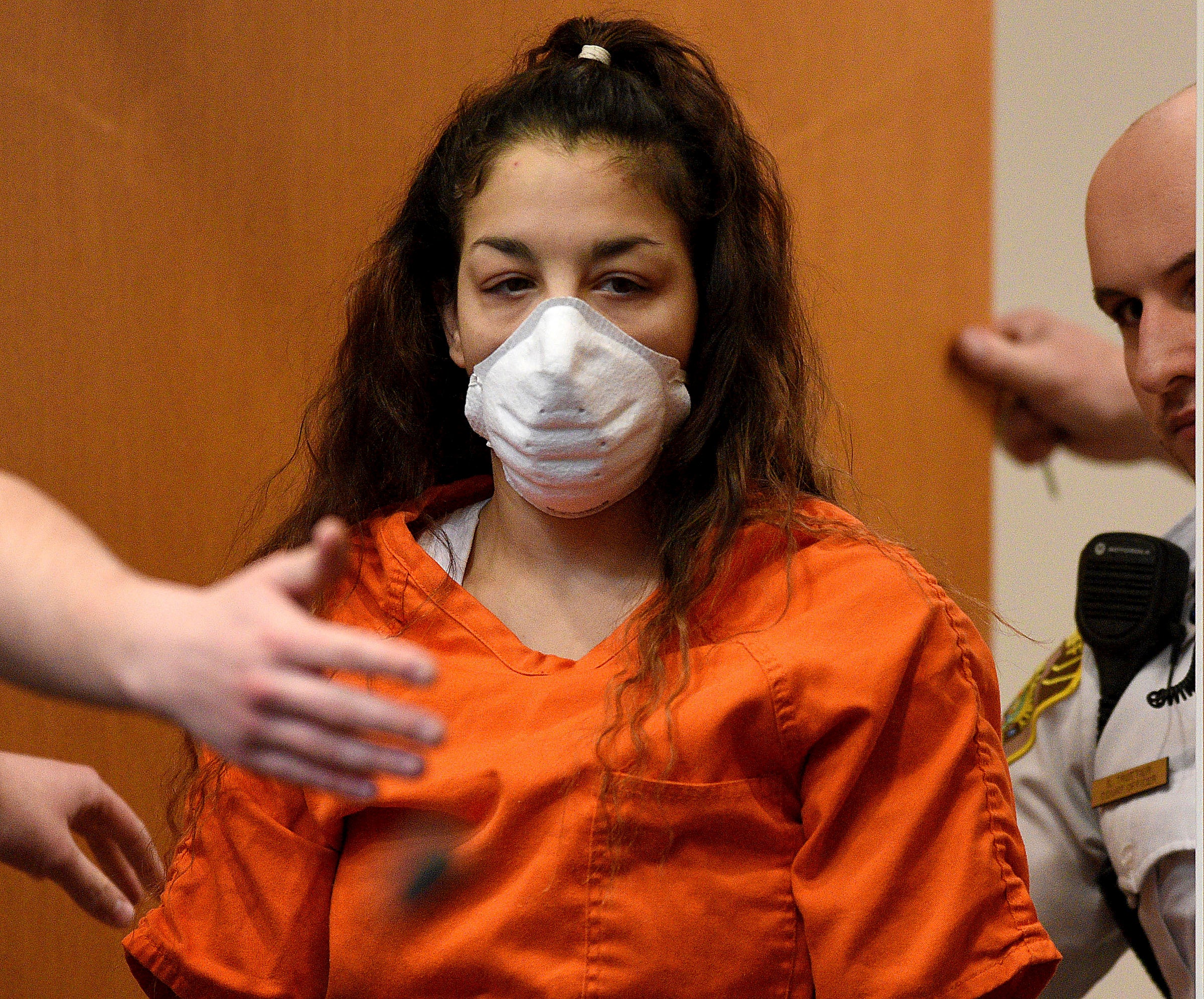 Kayla Montgomery arrives for her plea and sentencing hearing at Hillsborough County Superior Court in Manchester, N.H., on 18 November 2022. Montgomery, the stepmother of a New Hampshire girl who disappeared in 2019 at age 5 and is presumed dead was sent to prison for at least a year and a half Friday after pleading guilty to perjury charges.
