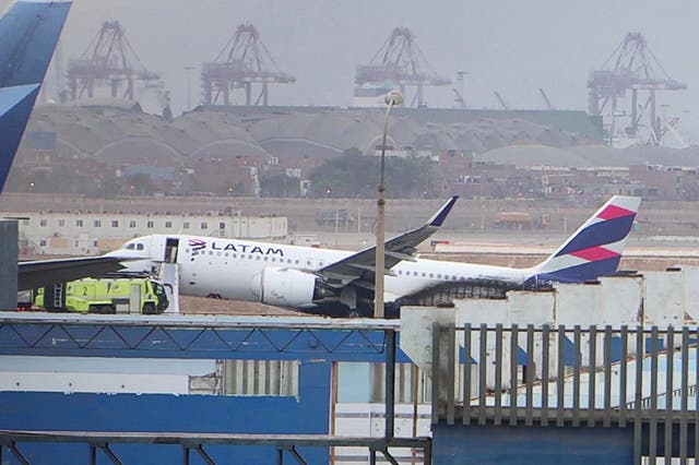 <p>This grab from an AFP video shows the LA2213 flight plane after it collided with a firefighting vehicle at the Jorge Chavez International Ariport in Lima</p>