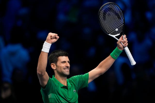 Novak Djokovic celebrates reaching the final in Turin (Antonio Calanni/AP)
