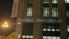 Activists project Elon Musk insults onto deserted Twitter HQ