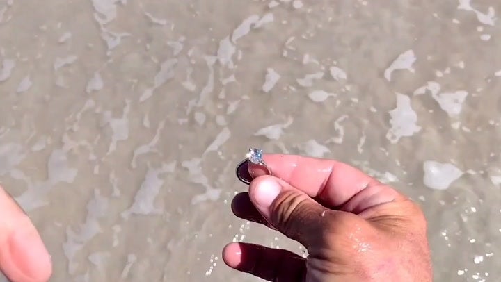 Moment metal detectorist finds lost $40,000 diamond ring buried on Florida beach