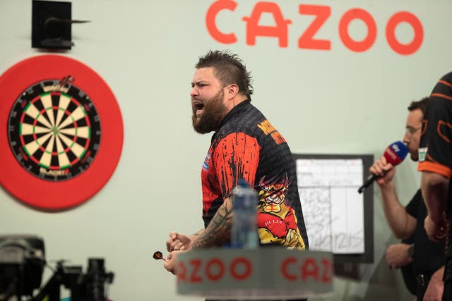 Michael Smith has won the Grand Slam of Darts to end his major title drought (Taylor Lanning/PDC/PA)