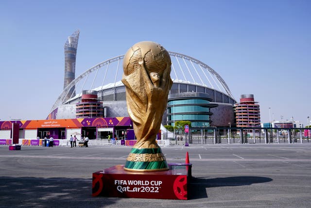 A giant world cup replica outside of the Khalifa International Stadium (Adam Davy/PA)