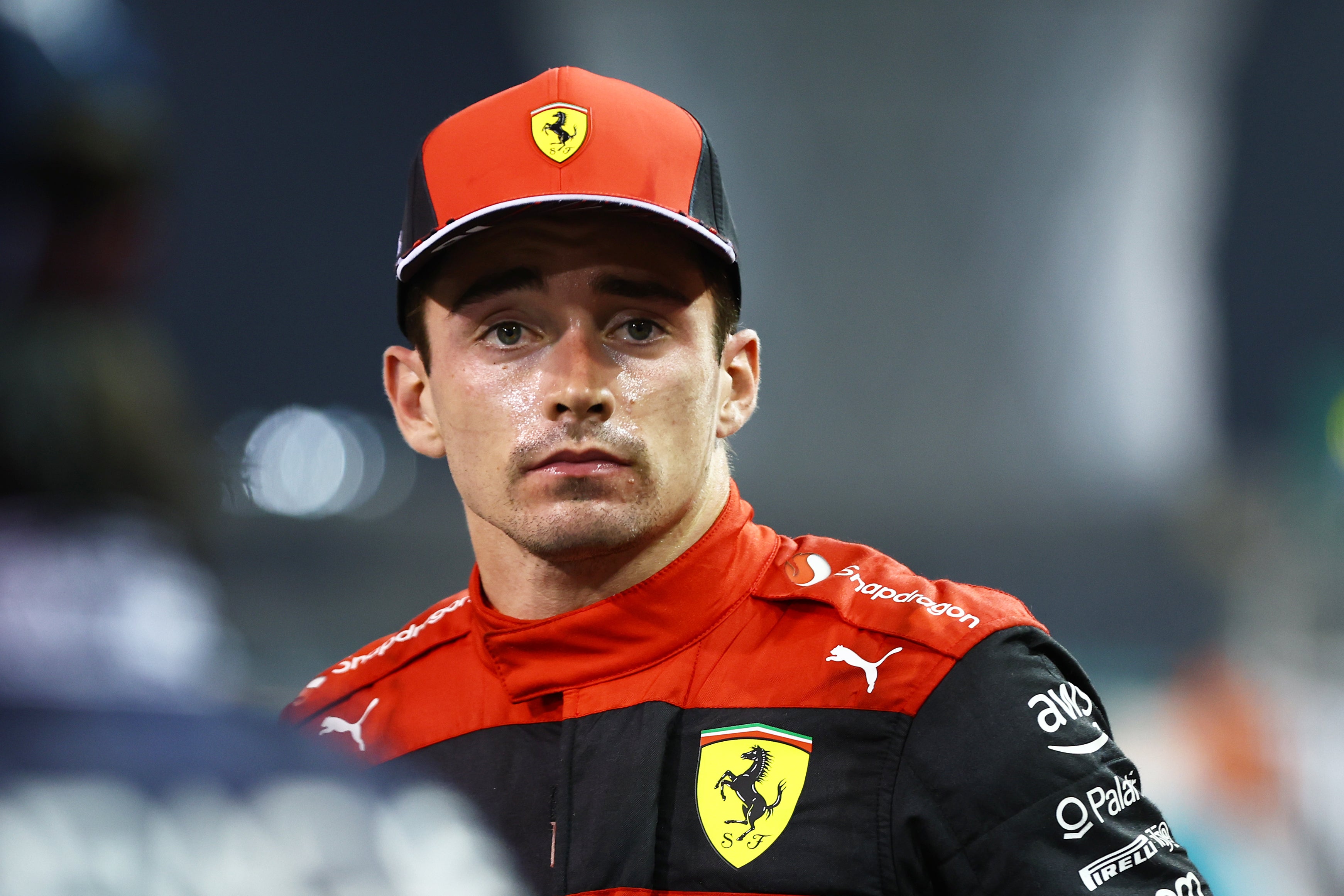 Second placed Charles Leclerc of Monaco and Ferrari looks on in parc ferme during the F1 Grand Prix of Abu Dhabi at Yas Marina Circuit