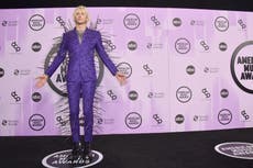Machine Gun Kelly dons extravagant spiked suit at the AMAs