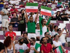 Iran fans boo own national anthem at World Cup match and demand ‘freedom’ for women