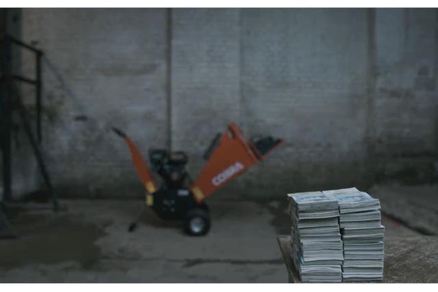 Screenshot taken from the Twitter feed @joelycett of comedian Joe Lycett appearing to shred £10,000 of his own money after he presented David Beckham with an ultimatum to pull out of his role as a Qatar ambassador or he would destroy the cash (Joe Lycett/PA)