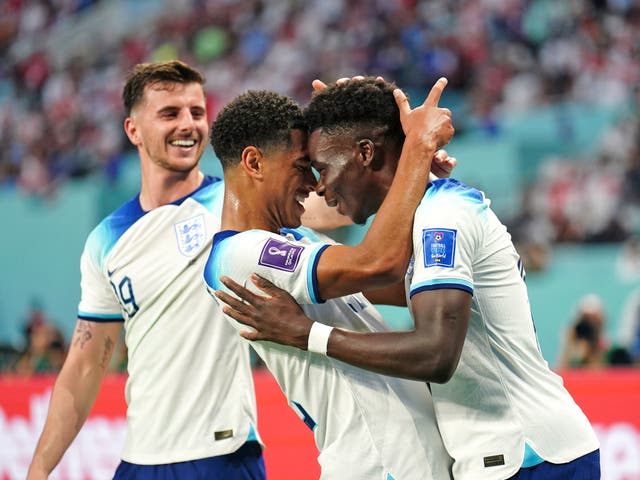 <p>Jude Bellingham congratulates Bukayo Saka after he scored England’s second </p>