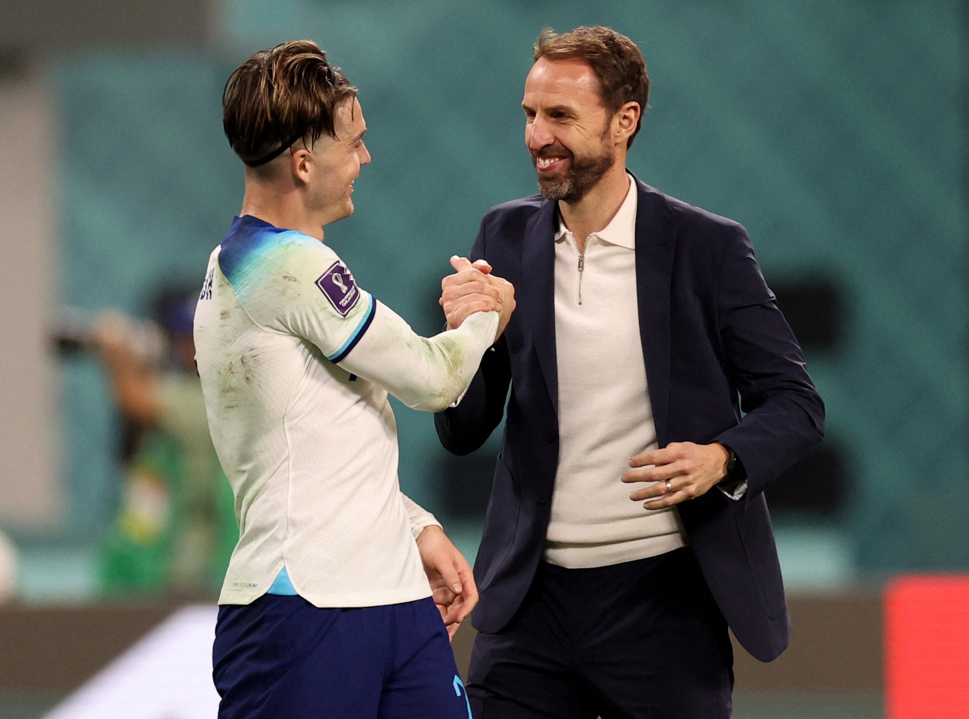 Grealish shakes hands with Gareth Southgate after the match