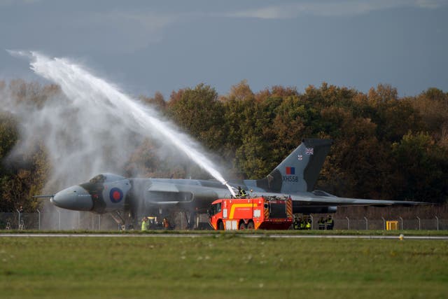 Emergency services spray Vulcan bomber XH558 after her engine run (Joe Giddens/PA)