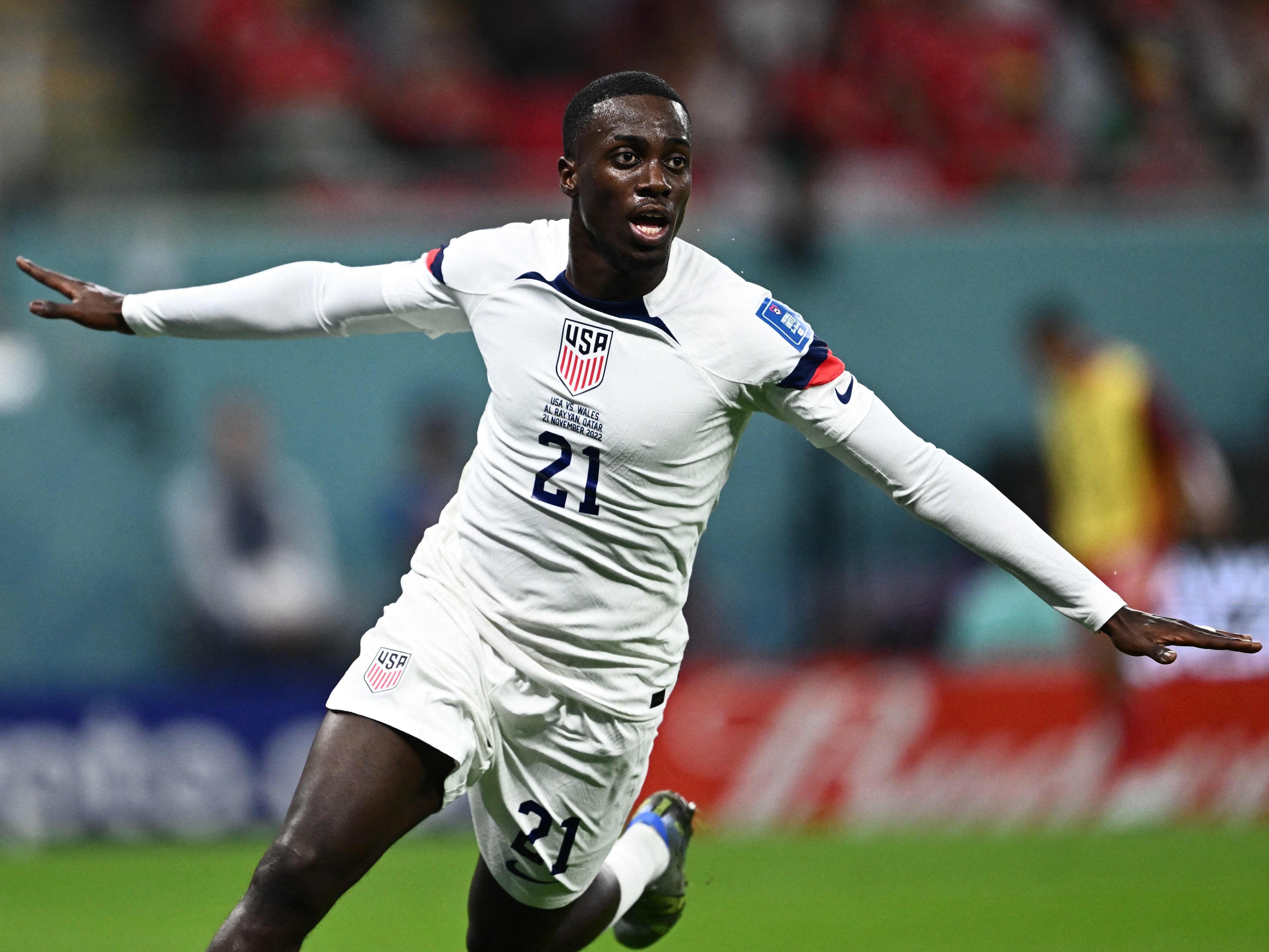Timothy Weah celebrates giving USA the lead against Wales at the World Cup