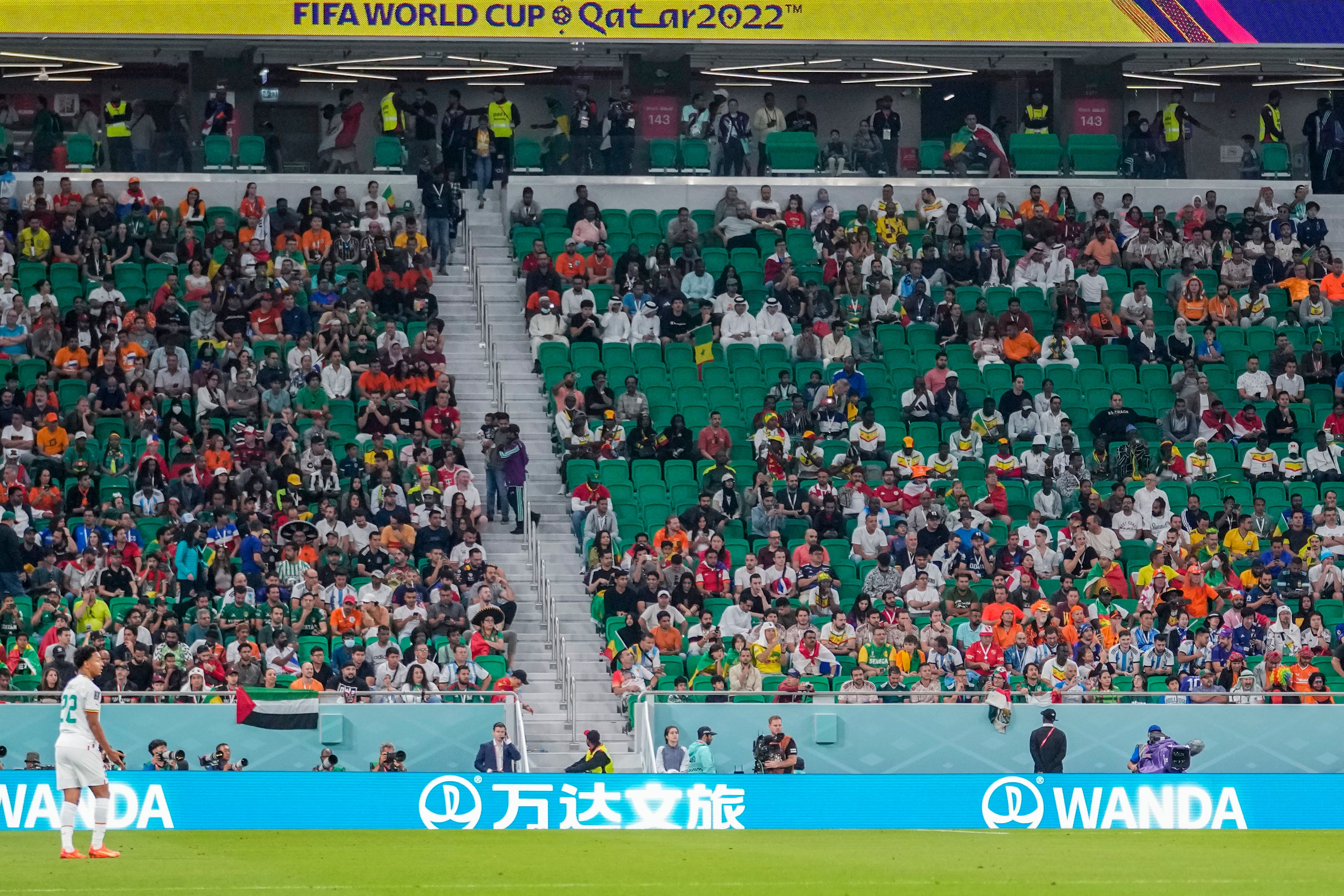 Plenty of empty seats could be seen at the Senegal v Netherlands match (Luca Bruno/AP)