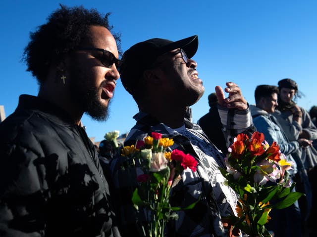 <p>Mourners pay their respects to the Club Q victims in Colorado Springs on 20 November 2022</p>