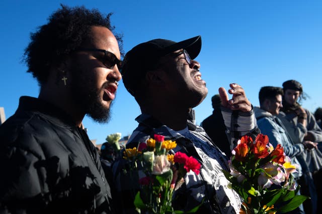 <p>Mourners pay their respects to the Club Q victims in Colorado Springs on 20 November 2022</p>