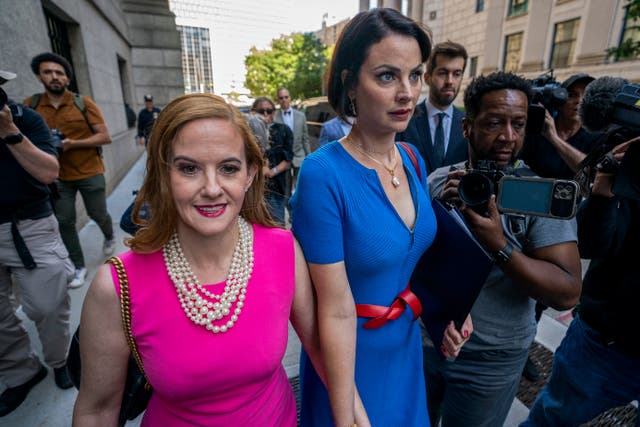 <p>FILE - Elizabeth Stein, left, and Sarah Ransome, an alleged victim of Jeffrey Epstein and Ghislaine Maxwell, walk to federal court, Tuesday, June 28, 2022, in New York. Sexual assault victims in New York will get a one-time opportunity to sue their abusers starting Thursday under a new law expected to bring a wave of litigation against prison guards, middle managers, doctors and a few prominent figures including former President Donald Trump. (AP Photo/John Minchillo, File)</p>