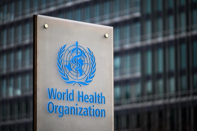 <p>This photograph taken on December 7, 2021 shows a sign of the World Health Organisation (WHO) at their headquarters in Geneva. </p>