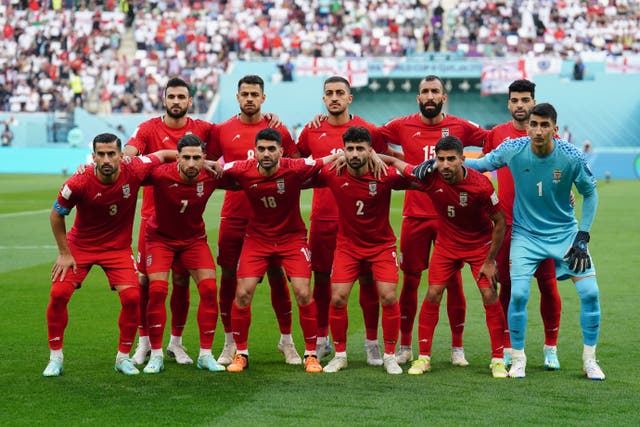Iran players before their match against England on Monday (PA)