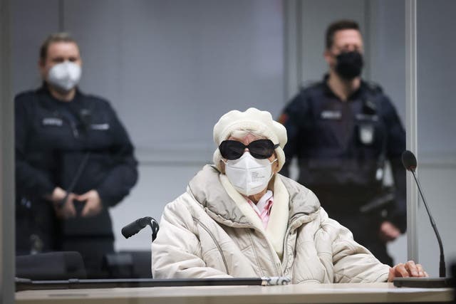 <p>Defendant Irmgard F., a former secretary for the SS commander of the Stutthof concentration camp, wears sunglasses and a face mask as she waits for the continuation of her trial at the court in Itzehoe </p>