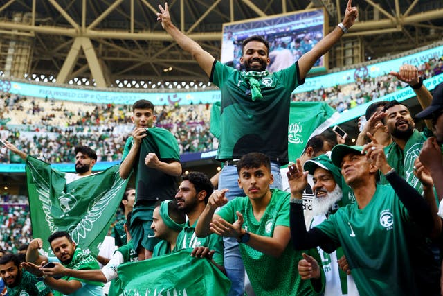<p>Saudi Arabian fans celebrate after the match</p>